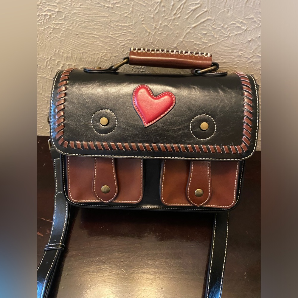 Beautiful black messenger bag with stitched heart